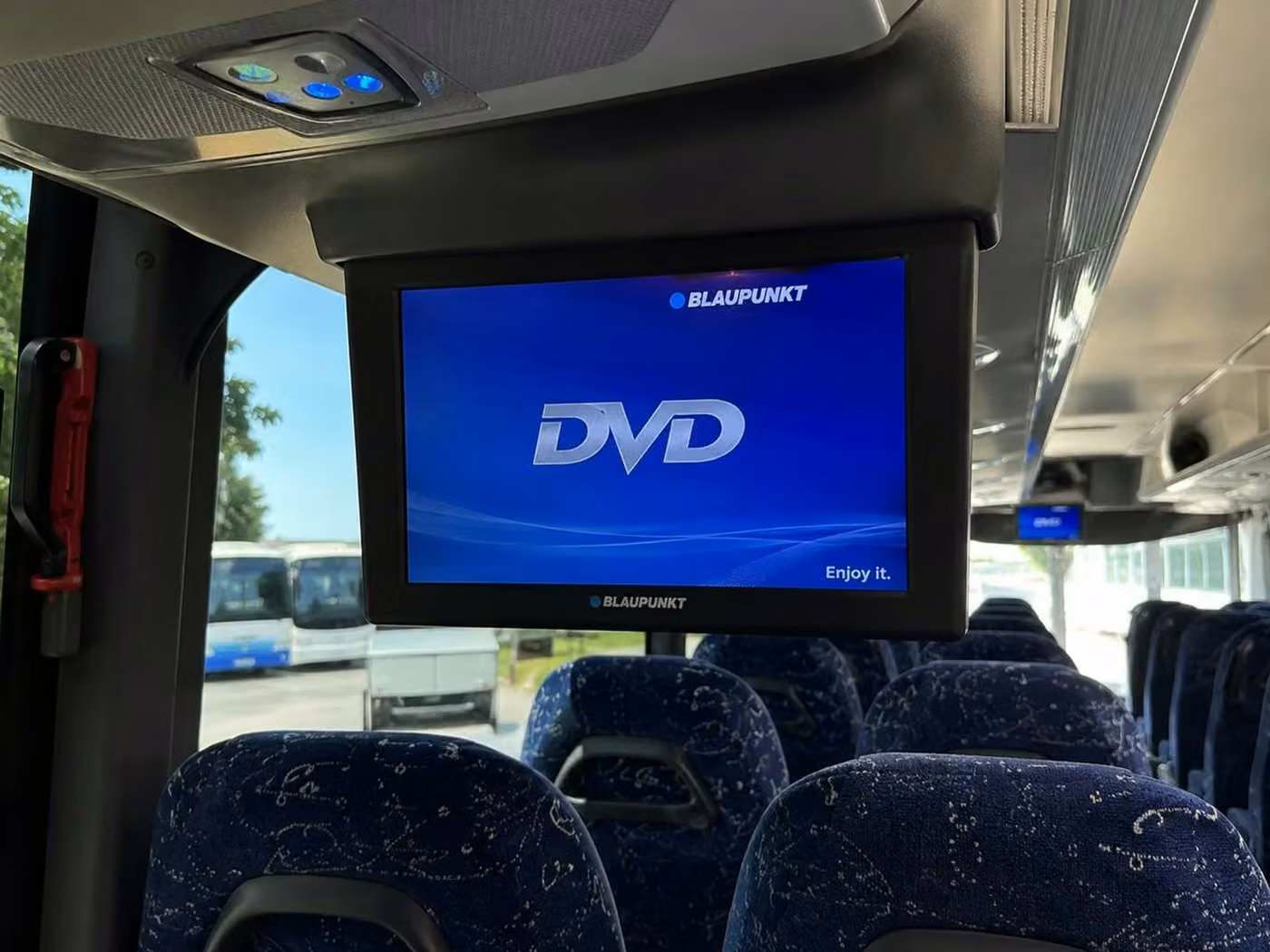 ankeny 56 passenger charter bus tvs